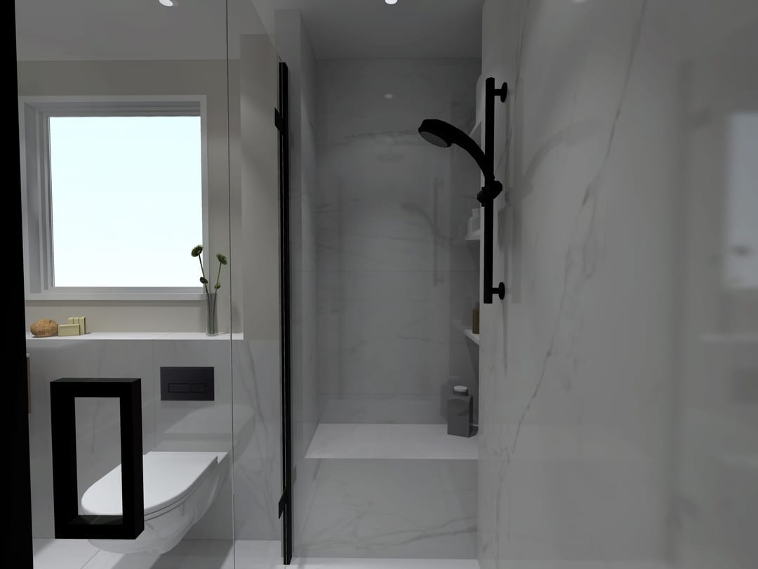 En-suite bathroom with a glass shower enclosure and grey tiling